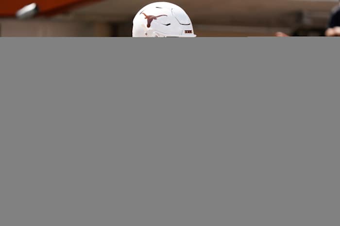 Texas Longhorns quarterback Arch Manning (16) warms up before the game against the Kansas Jayhawks at Darrell K Royal-Texas Memorial Stadium.